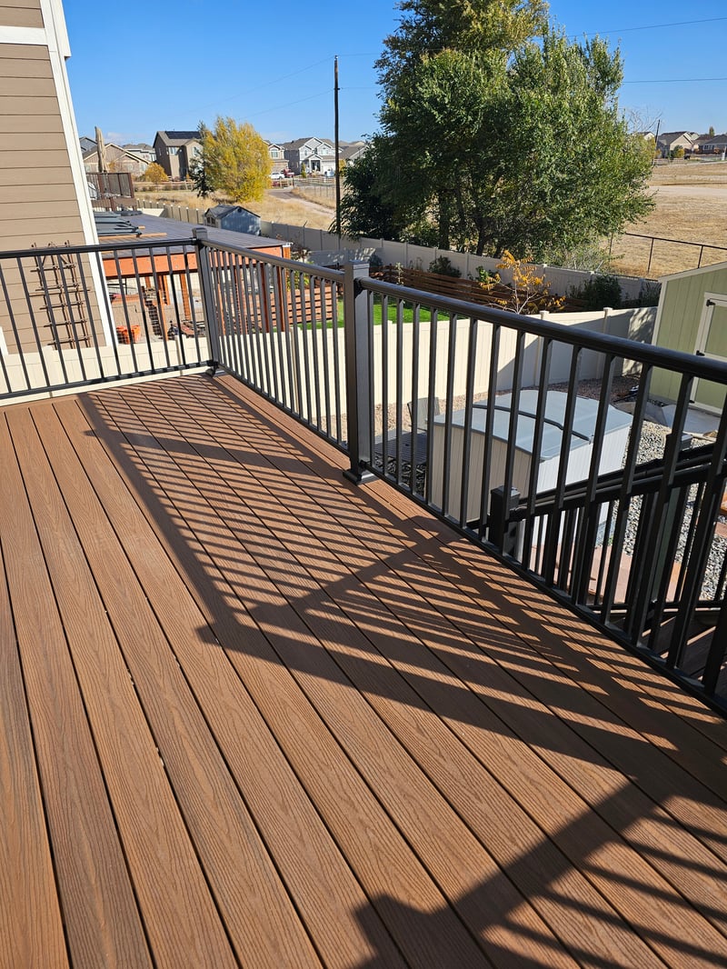 Deck stairs with landing and matching railings