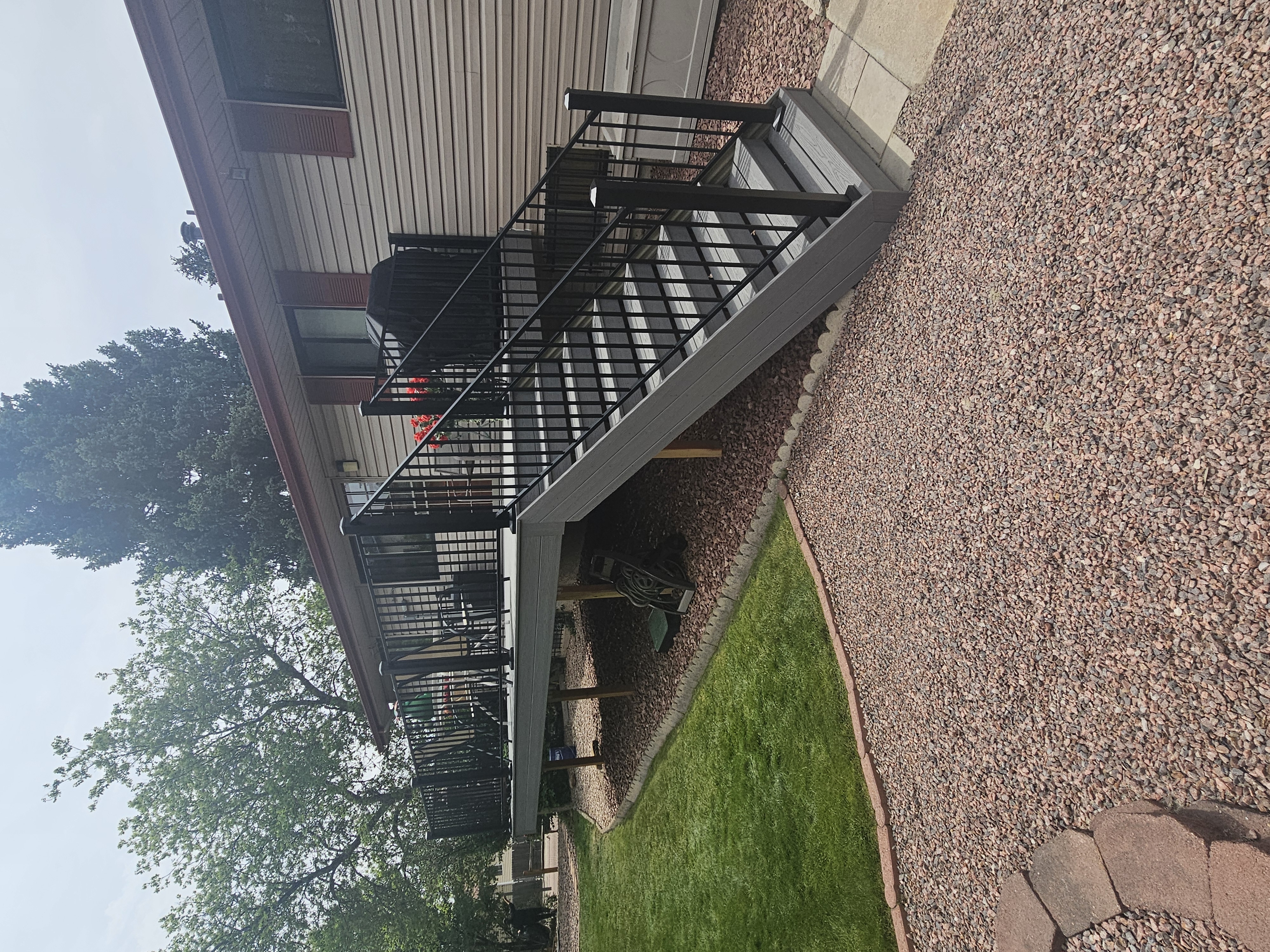 Wraparound custom deck with built-in bench seating