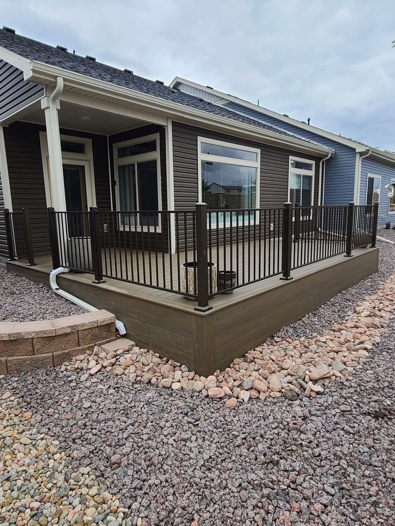 Finished composite deck with picture-frame border detail