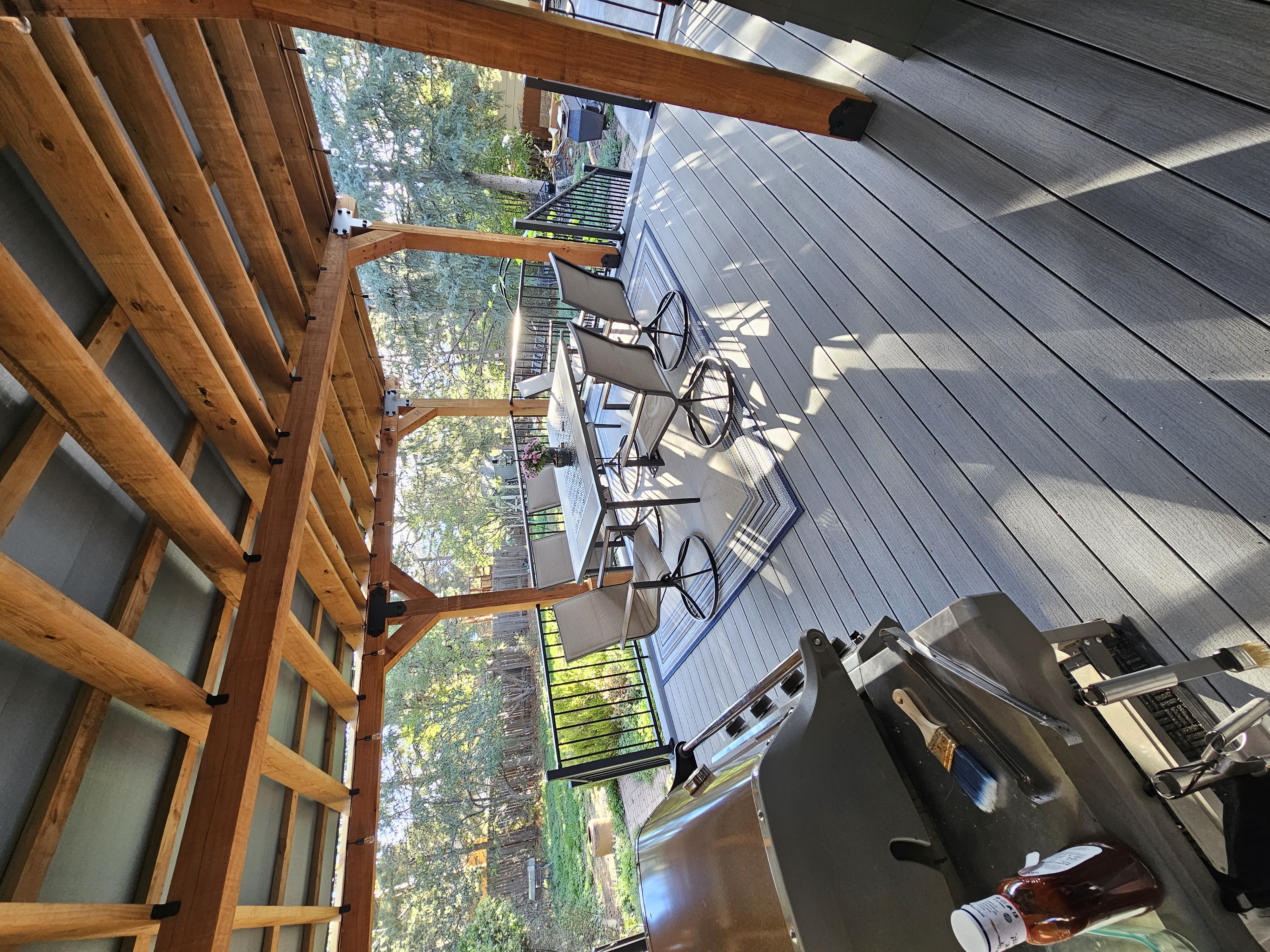 Finished composite deck with picture-frame border detail