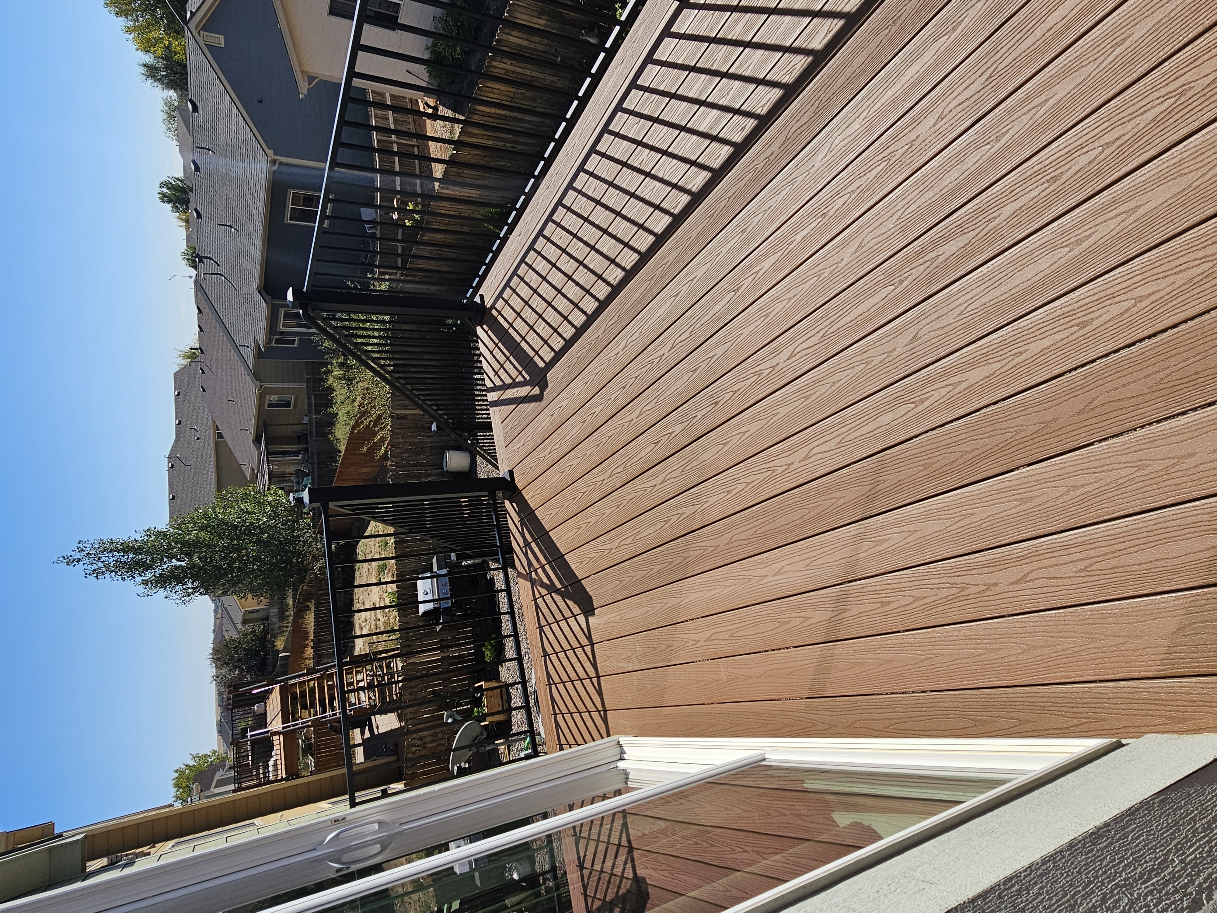 Finished composite deck with picture-frame border detail