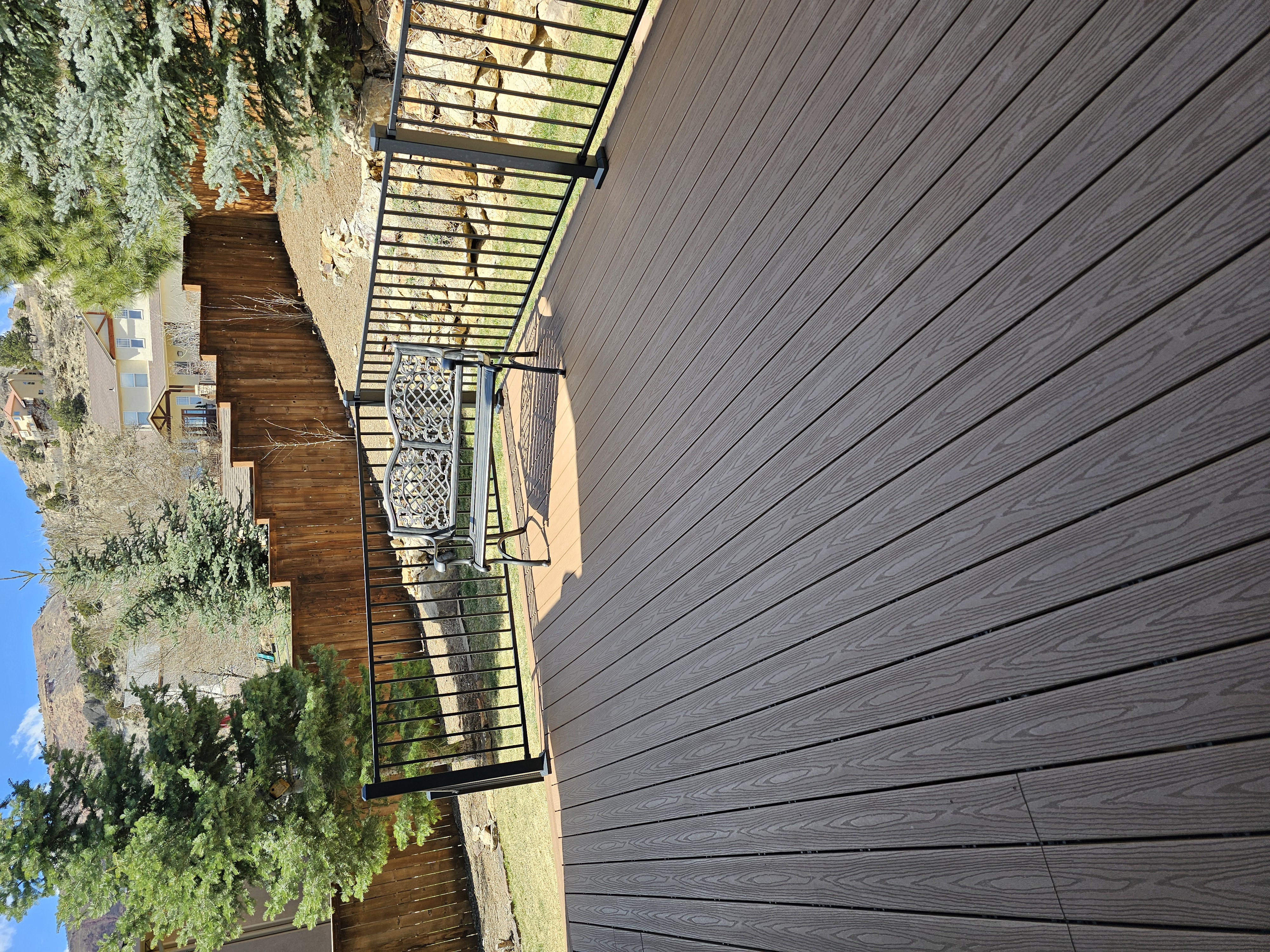 Finished composite deck with picture-frame border detail